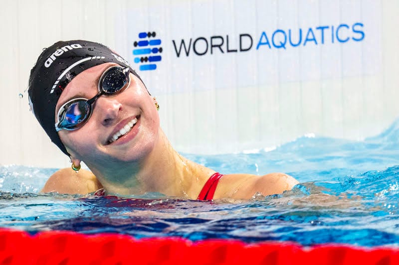 Douglass Dominates In 2:12.50, Her Third S/C 200m Breast WR In Six Weeks, The Russian Question Sunk