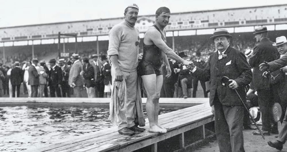 When Over 60,000 On Each Of 11 Days Flocked To See Olympic Swimming & Taylor’s Triple Gold At White City In 1908 post image